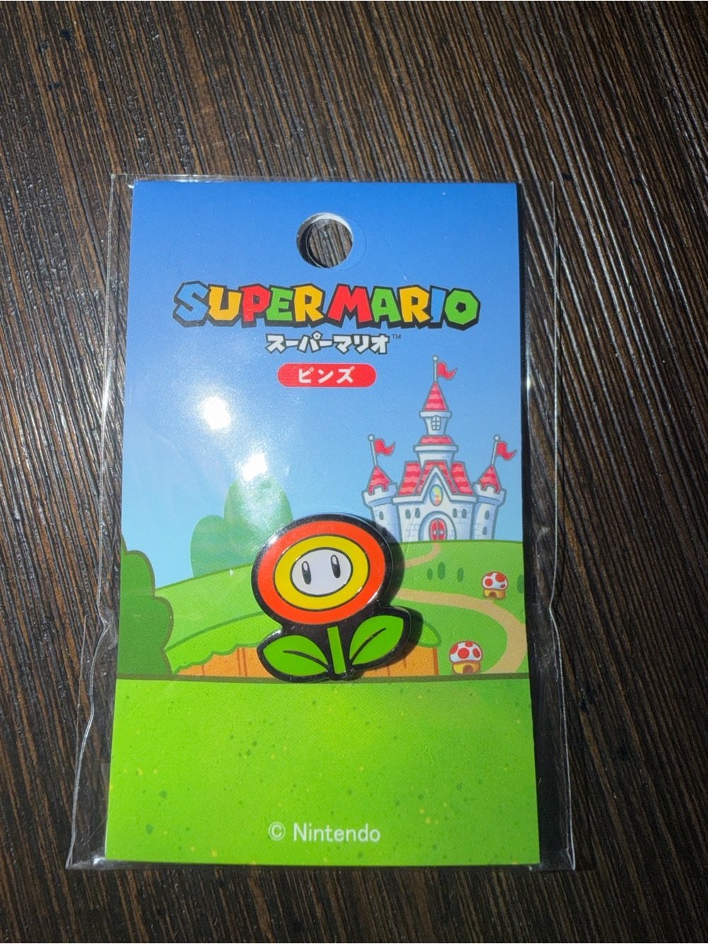 Nintendo Super Mario Fire Flower Enamel Pin - Orange, Yellow & Green